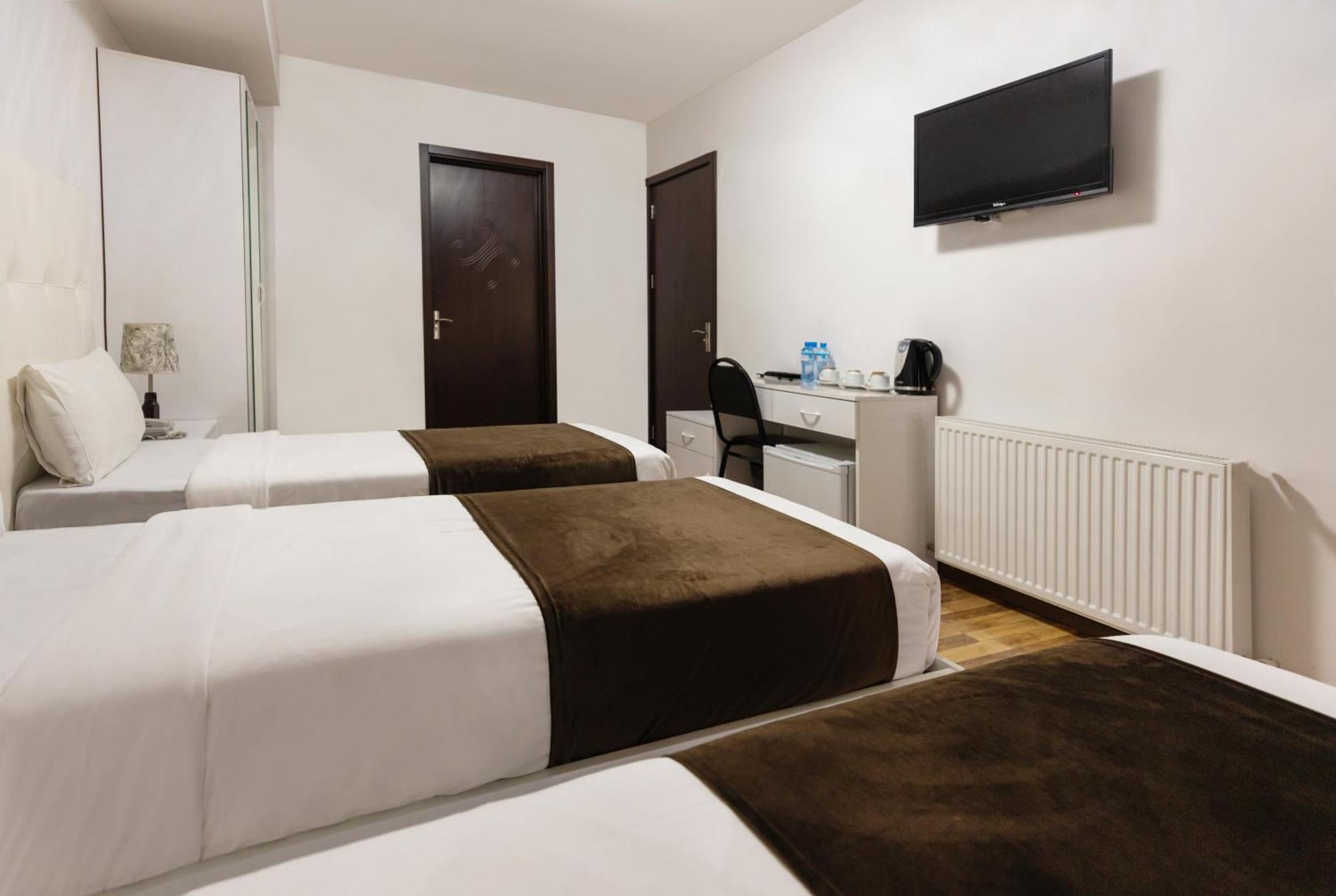 Hotel Grand Palace Тбілісі Номер фото