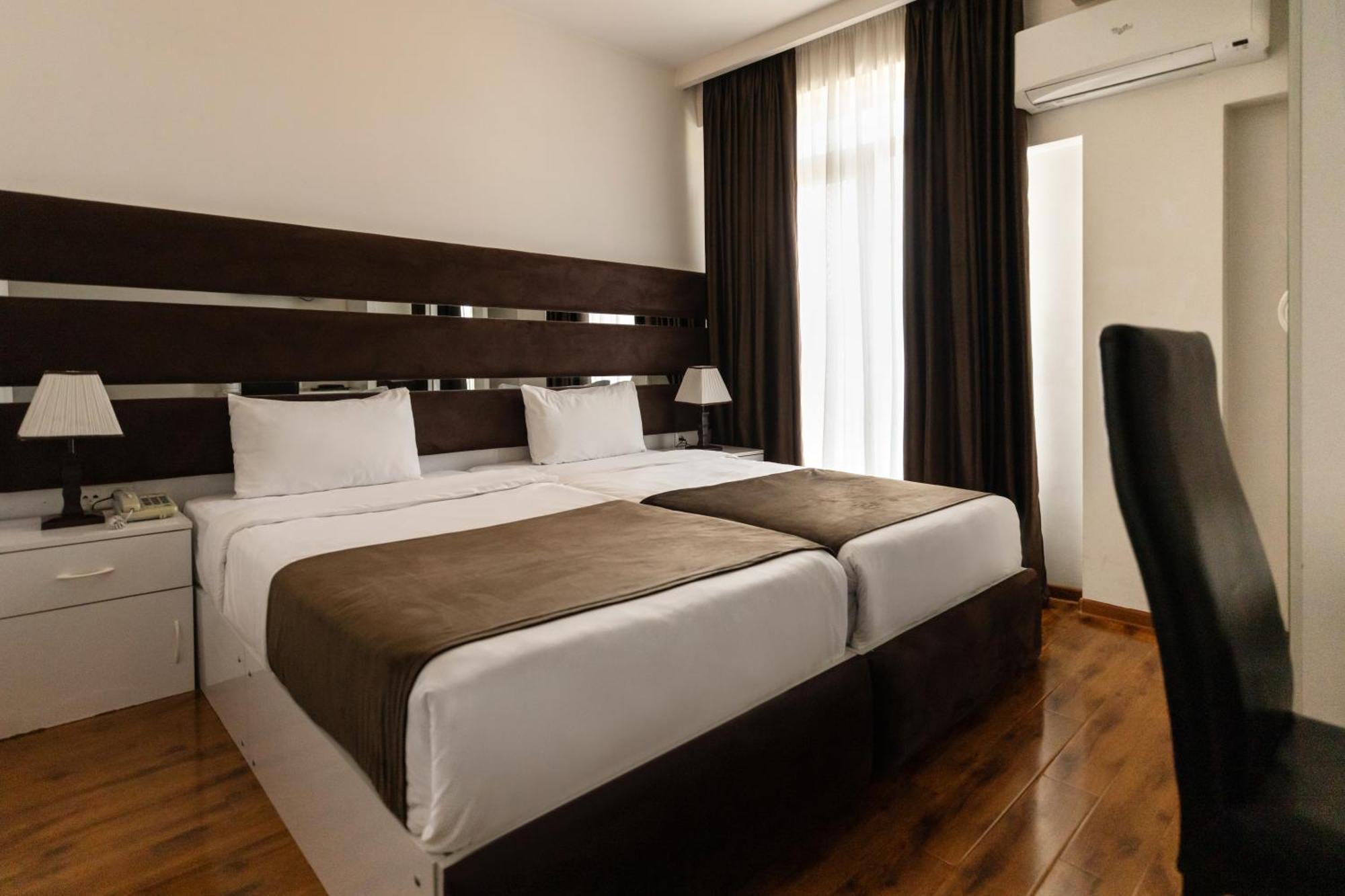 Hotel Grand Palace Тбілісі Номер фото
